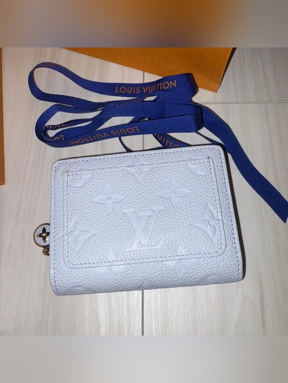 Louis Vuitton Pale Blue Leather Compact Wallet with Gold Accents - Picture 3 of 10